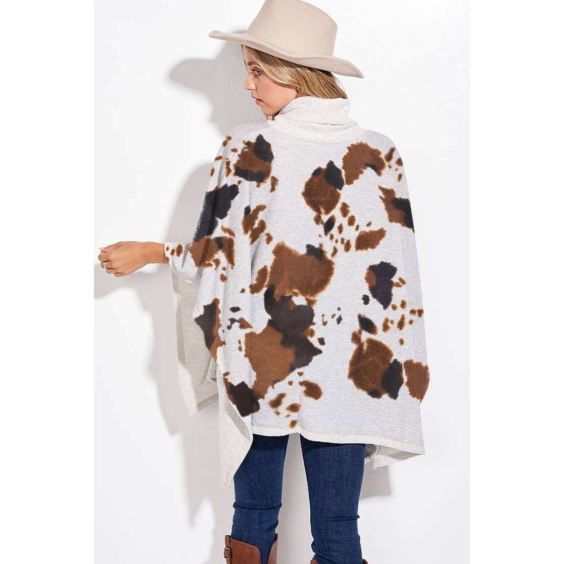 Cow print turtle neck poncho
