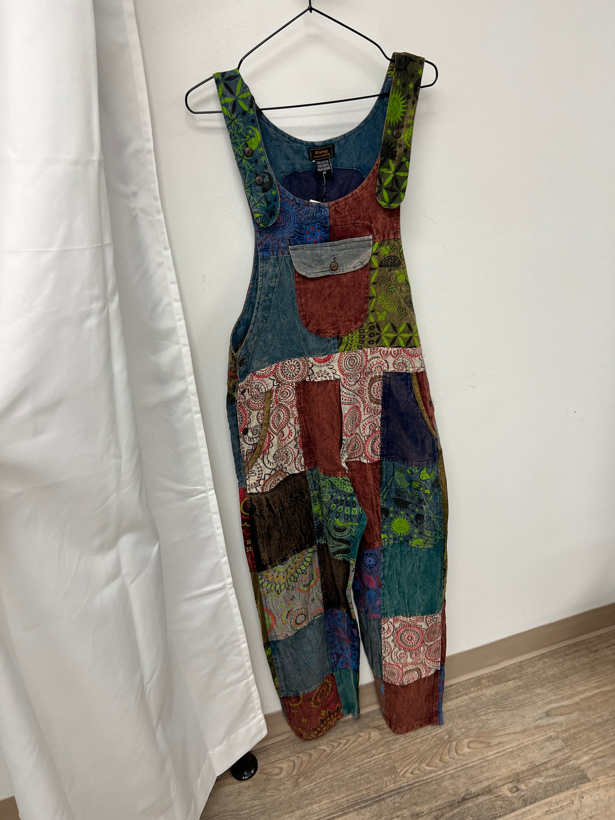 Full-length front view of multicolor patchwork cotton jumpsuit